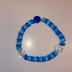 Blue smiley face Clay bead bracelet